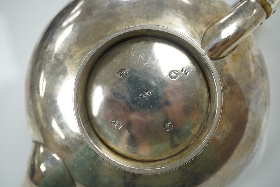 A Victorian silver bachelor's squat circular teapot, indistinct maker's mark, London, 1845, gross weight 13.8oz. CITES Submission reference XJ224VHB. Condition - fair